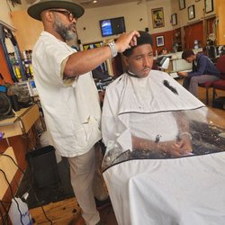 In the Cut - Trevor uses the shears to shape my son's hair to perfection while giving great advice on how to navigate young adulthood.