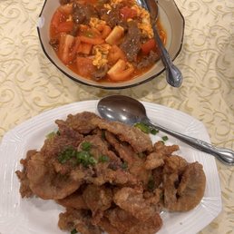 Salt and spicy fried pork chop; egg and tomato with beef Salt and spicy fried pork chop; egg and tomato with beef