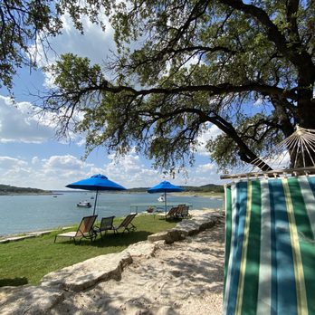 Lake Travis Waterloo Adventures - Hammock set up, sand, grass, lawn chairs and tables. - Water Parks Near Me - Leander, Texas