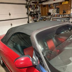 California MotorCars, - Black soft top. Missing white top