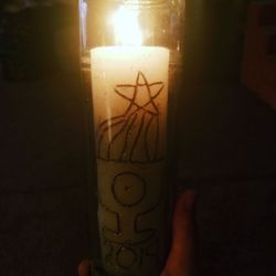 Intuitive Shana - My New Year's candle just lit on NYE.