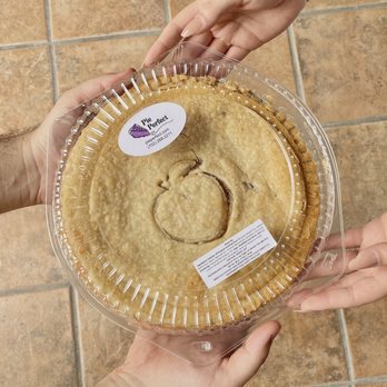Pie Perfect - two hands holding a pie - Desserts Near Me - Las Vegas, Nevada Pie Perfect - two hands holding a pie - Desserts Near Me - Las Vegas, Nevada