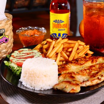 Okay Burger - a plate of food on a table - Burgers Near Me - Miami, Florida