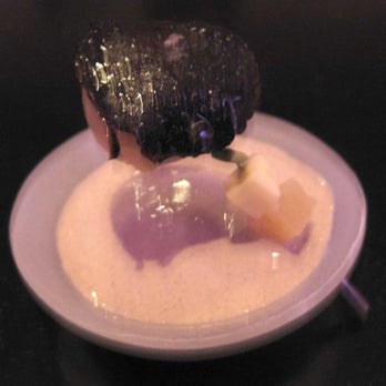 Alinea - Potato you pull off the pin and drop in the potato mixture below a la sake bomb style - New American Near Me - Chicago, Illinois Alinea - Potato you pull off the pin and drop in the potato mixture below a la sake bomb style - New American Near Me - Chicago, Illinois