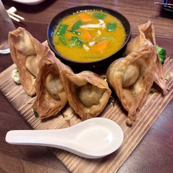 RedFarm - Duck Wontons with curry sauce. Yum! - Chinese Near Me - Austin, Texas RedFarm - Duck Wontons with curry sauce. Yum! - Chinese Near Me - Austin, Texas