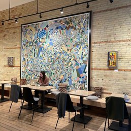 Beautiful interior space at Aldea & especially loved this mosaic on the wall