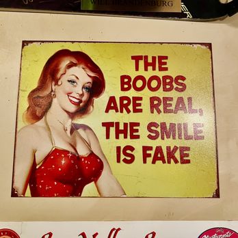 The Cellar Pub - a woman in a red dress with the words the boos are real the smile is fake - Pubs Near Me - Ketchum, Idaho The Cellar Pub - a woman in a red dress with the words the boos are real the smile is fake - Pubs Near Me - Ketchum, Idaho