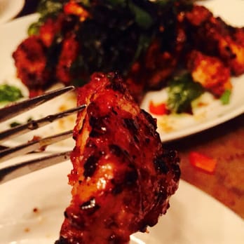 Buddha Ruksa - Crispy garlic chicken - $12 on dinner menu - Thai Near Me - Seattle, Washington