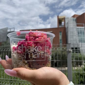 Shake Smart - a hand holding a cup of smoothie - Juice Bars & Smoothies Near Me - College Station, Texas Shake Smart - a hand holding a cup of smoothie - Juice Bars & Smoothies Near Me - College Station, Texas