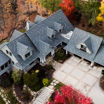 Tri-County Enterprises - This wonderful home in Eastern Iowa exudes Autumn beauty thanks to roof work from Tri-County Enterprises. - Roofing Near Me - Cedar Rapids, Iowa