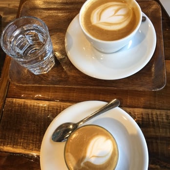 Trio Coffee - Cortado and a cappuccino. Cortado not as bitter as the first time I ordered it unfortunately but still good. - Cafes Near Me - Flower Mound, Texas