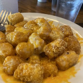 Hickory Tavern - Tater tots with cheese - Sports Bars Near Me - Charlotte, North Carolina Hickory Tavern - Tater tots with cheese - Sports Bars Near Me - Charlotte, North Carolina
