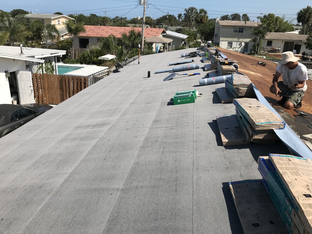 Slide of JVR Roofing