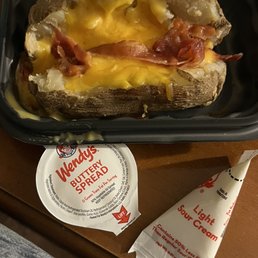 Bacon and cheese baked potato. Surprisingly good and very filling. Sour cream was a disappointment.