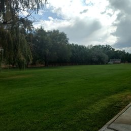 Best dog friendly establishment with a large grassy field out back Best dog friendly establishment with a large grassy field out back
