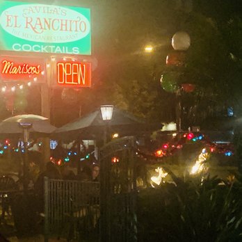 Avilas El Ranchito - Patio, front of restaurant, cozy fireplace and comfy chairs and tables. - Mexican Near Me - Costa Mesa, California Avilas El Ranchito - Patio, front of restaurant, cozy fireplace and comfy chairs and tables. - Mexican Near Me - Costa Mesa, California