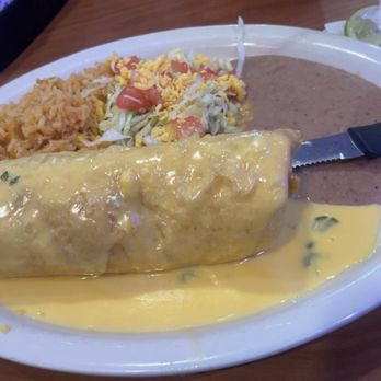Camino Real Restaurant - Chimichanga smothered in queso - Mexican Near Me - Austin, Texas Camino Real Restaurant - Chimichanga smothered in queso - Mexican Near Me - Austin, Texas