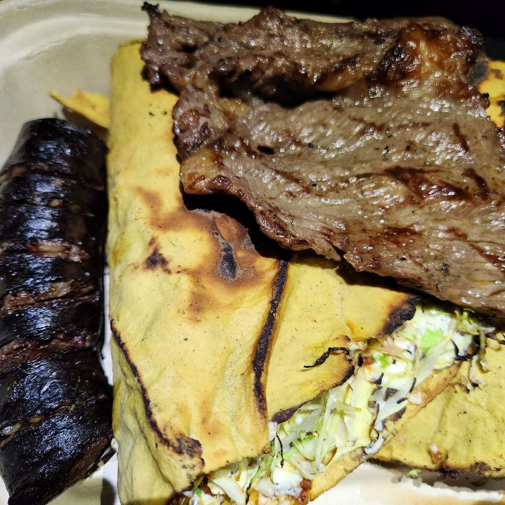 Tlayuda with three meats Tlayuda with three meats