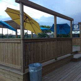 Patio and GLB sign in the distance. (Storm clouds gathering!)