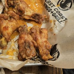 East Coast Wings + Grill - Buffalo lemon pepper. Hotter than the mango habenero which was rated hotter. Made no sense lol