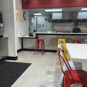 Crimson Coward - The waiting & eating area. - Chicken Shop Near Me - Fredericksburg, Virginia