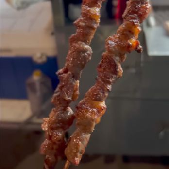 Xinjiang BBQ Cart - two skewers of meat on a stick - Barbeque Near Me - Flushing, New York Xinjiang BBQ Cart - two skewers of meat on a stick - Barbeque Near Me - Flushing, New York