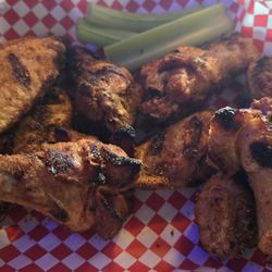 Southbound Saloon & Eatery - Pineapple jerk rub wings on the left, sweet cajun rub wings on the right