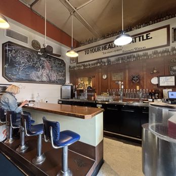 Emmett Watson's Oyster Bar - The bar at Emmett Watson's. "To Your Health Seattle. Ear more oysters." - Seafood Near Me - Seattle, Washington