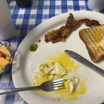 Rio Ranch Cafe - Over easy eggs with bacon, white toasts and fruit. - Mexican Near Me - Kerrville, Texas Rio Ranch Cafe - Over easy eggs with bacon, white toasts and fruit. - Mexican Near Me - Kerrville, Texas