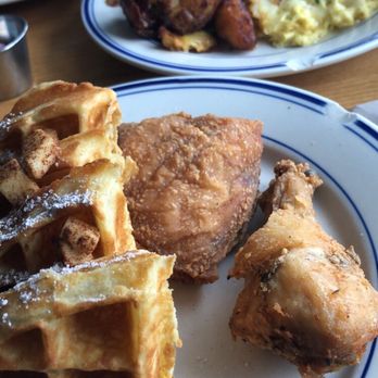 Sweet Chick - Chicken and Cinnamon apple flavored waffles. Distant in the picture is home fries, toast and eggs to share. - Southern Near Me - Brooklyn, New York Sweet Chick - Chicken and Cinnamon apple flavored waffles. Distant in the picture is home fries, toast and eggs to share. - Southern Near Me - Brooklyn, New York