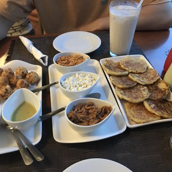 Kaxapa Factory - Cheese balls starter on the right and the cachapitas starter on the middle/left - Latin American Near Me - Playa del Carmen, ROO