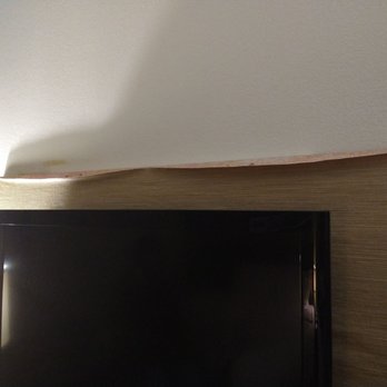 Sleep Inn & Suites Topeka West I-70 Wanamaker - Wallpaper behind TV peeling excessively and bubbles in it - Hotels Near Me - Topeka, Kansas Sleep Inn & Suites Topeka West I-70 Wanamaker - Wallpaper behind TV peeling excessively and bubbles in it - Hotels Near Me - Topeka, Kansas