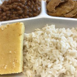 Mr. Tee’s Awesome BBQ & Home Cooking - Vegetable plate containing baked beans, fried green tomatoes, rice, and cornbread
