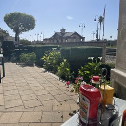 Sunny patio by the train station
