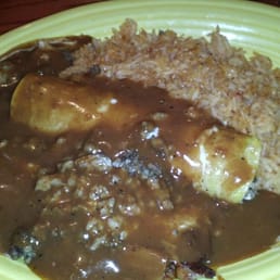 Tamale, enchilada and Mexican rice.