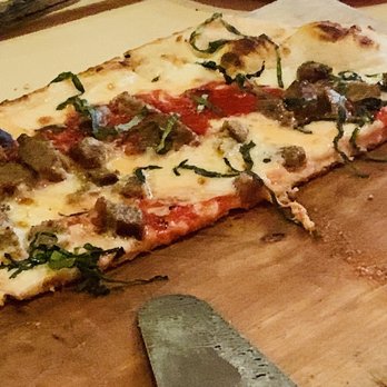 Numero 28 - Margarita pizza with half Italian sausage - Italian Near Me - Austin, Texas Numero 28 - Margarita pizza with half Italian sausage - Italian Near Me - Austin, Texas