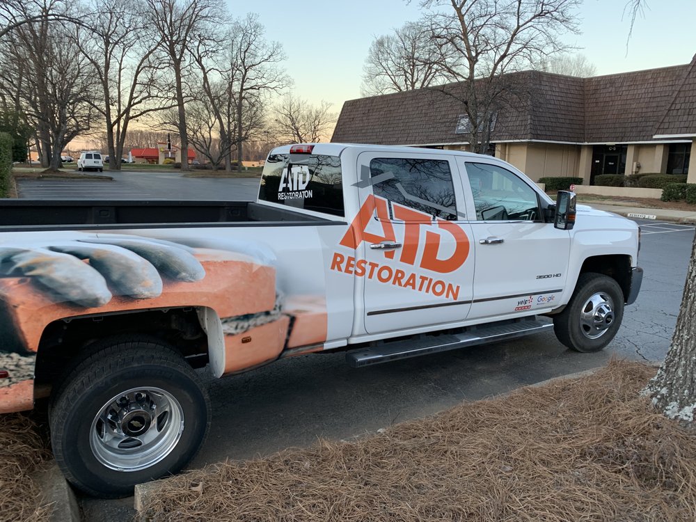 Slide of ATD Roofing