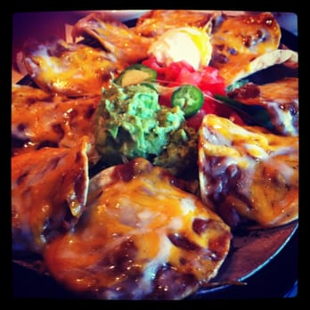 Uncle Julio's - Bean and cheese nachos - Mexican Near Me - Allen, Texas Uncle Julio's - Bean and cheese nachos - Mexican Near Me - Allen, Texas