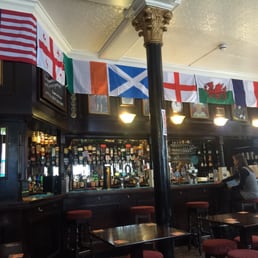 Interior of pub. Time for Adnams