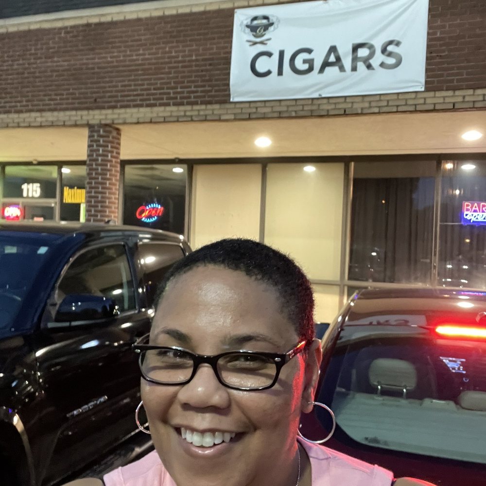 The G Spot - a woman standing in front of a cigar shop - Cigar Bars Near Me - Memphis, Tennessee The G Spot - a woman standing in front of a cigar shop - Cigar Bars Near Me - Memphis, Tennessee