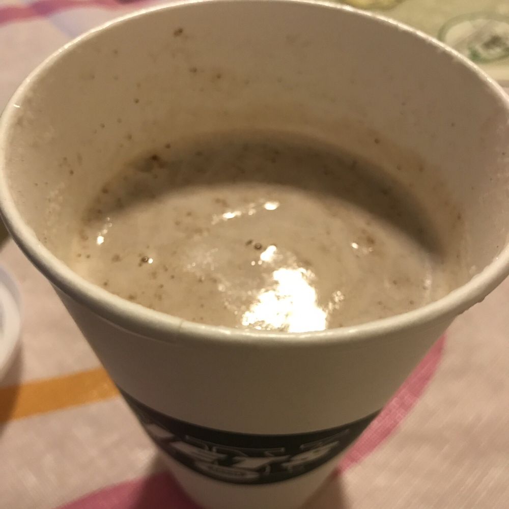 Dunkin' - a cup of coffee on a table - Donuts Near Me - Flushing, New York Dunkin' - a cup of coffee on a table - Donuts Near Me - Flushing, New York