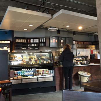 Starbucks - a woman standing in a coffee shop - Coffee & Tea Near Me - Halifax, Nova Scotia Starbucks - a woman standing in a coffee shop - Coffee & Tea Near Me - Halifax, Nova Scotia