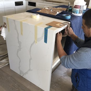 Blue Stone Fabrication - Angel preparing the waterfall - Kitchen & Bath Near Me - San Francisco, California Blue Stone Fabrication - Angel preparing the waterfall - Kitchen & Bath Near Me - San Francisco, California