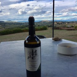 Fattoria Il Piano - Chianti with the landscape behind it.