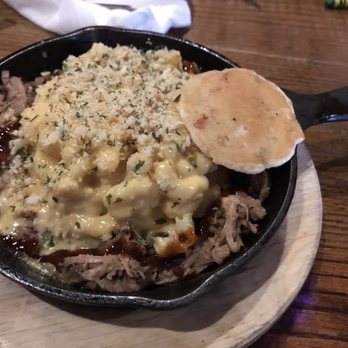 Puckett's Restaurant - Piggy Mac in hot skillet. - Southern Near Me - Chattanooga, Tennessee Puckett's Restaurant - Piggy Mac in hot skillet. - Southern Near Me - Chattanooga, Tennessee