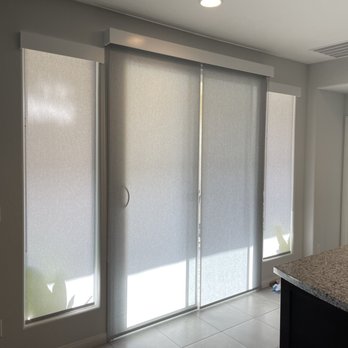 Day and Night Blinds - Norman Roller Sahdes with split opening on a sliding glass door - Shades & Blinds Near Me - Henderson, Nevada Day and Night Blinds - Norman Roller Sahdes with split opening on a sliding glass door - Shades & Blinds Near Me - Henderson, Nevada