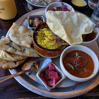 Curry Up Now Indian Restaurant and Catering - Thali plate with cauliflower rice - Indian Near Me - Oakland, California Curry Up Now Indian Restaurant and Catering - Thali plate with cauliflower rice - Indian Near Me - Oakland, California