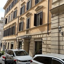 Hotel Barocco - Exterior with a fountain by Bernini in the piazza beyond.