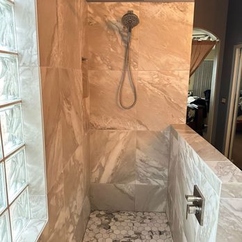 Cactus Plumbing - a shower with a shower head - Plumbing Near Me - Mesa, Arizona