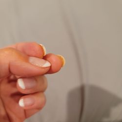 ToBe Nails & Spa - 24 hours later. Particles getting stuck in between tip and real nail